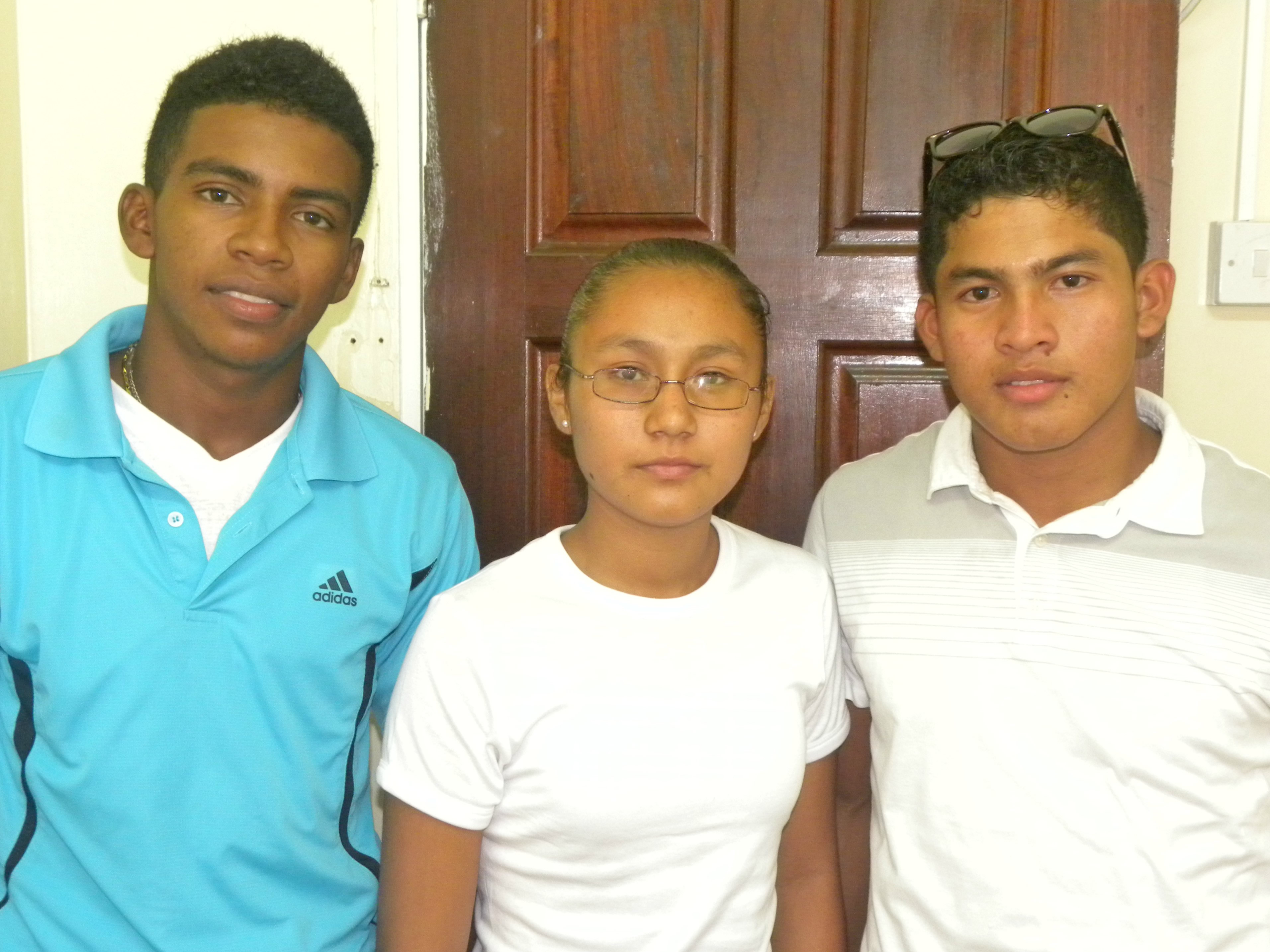 (Left to right) Andrew Abbensetts, Esther Eusebio, and Kenroy Robinson will participate in a four year apprenticeship programme with the Guyana Power and Light Inc.